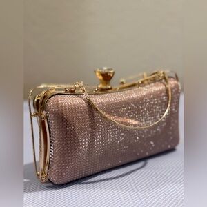 Shimmer and Sparkle with this Dazzling Rose Gold Clutch